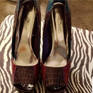 Purple/Pink peep-toe heels.